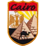 The word Cairo above two pyramids and a camel.
