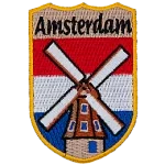 Amsterdam is embroidered at the top. An old-fashioned windmill is centred over top of the flag of the Netherlands.