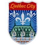 The words Québec City are above a historic building with a green roof.