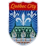The words Québec City are above a historic building with a green roof.