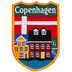 Copenhagen is embroidered above a city street. The flag of Denmark replaces the sky.