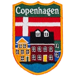 Copenhagen is embroidered above a city street. The flag of Denmark replaces the sky.