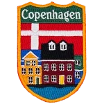 Copenhagen is embroidered above a city street. The flag of Denmark replaces the sky.