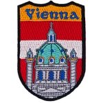 The name Vienna is above the church of Rektoratskirche St. Karl Borromaus, commonly called Karlskirche. In the background is the flag of Austria.