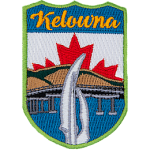 The name Kelowna is above the Kelowna sails. The sky is replaced by the Canadian flag.