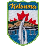 The name Kelowna is above the Kelowna sails. The sky is replaced by the Canadian flag.