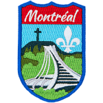 The Olympic Stadium of Montréal is in front of the flag of Montréal. The name Montréal is at the top.