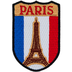 The Eiffel tower is in front of the flag of France. The name Paris is above it.