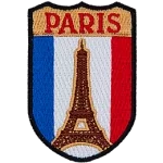The Eiffel tower is in front of the flag of France. The name Paris is above it.