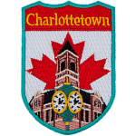 This shield-shaped crest has the text Charlottetown at the top. The iconic clock in front of Charlottetown city hall is displayed with the flag of Canada behind it.