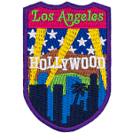 The word Los Angeles is underneath a myriad of Los Angeles-themed symbols.