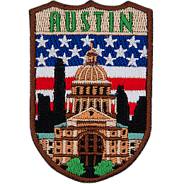 The word Austin is above the parliament building in Austin. The flag of the USA is in the background.