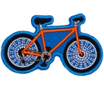 An orange bicycle on a blue background.