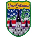 New Orleans is stitched above the St. Louis Cathedral surrounded by musical notes. The sky is the USA flag.
