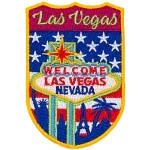 Las Vegas is stitched above a sign that says Welcome Las Vegas Nevada. The background is the USA flag.