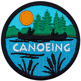 The silhouette of a person canoeing on a peaceful lake surrounded by forest scenery is displayed on this round patch.