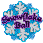 A snowflake with the words Snowflake Ball in purple thread across the middle.