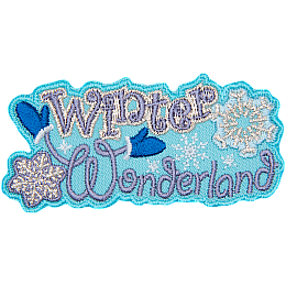 The words Winter Wonderland are stitched in silver thread. The W is wearing mittens, and two snowflakes frame the sides of the patch.