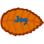 An orange leaf with blue text that reads Joy.