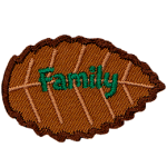 A brown leaf with green text that says family.