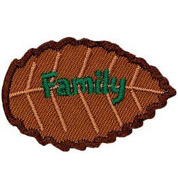 A brown leaf with green text that says family.