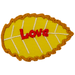 A yellow leaf with red text that reads Love.