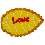 A yellow leaf with red text that reads Love.