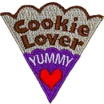 The words Cookie Lover Yummy are on a cookie slice with a red heart and purple icing.
