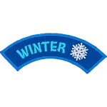 This rounded rocker has the word Winter followed by a snowflake.