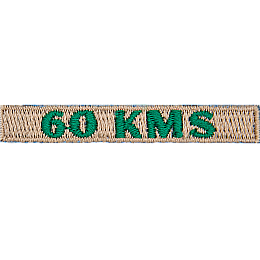 The number 60 KMS is stitched in green on a cream-coloured background.