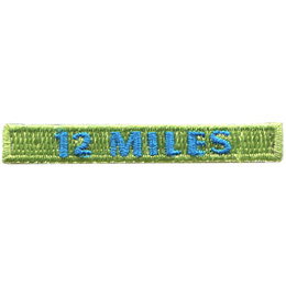 A green patch with the words 12 Miles in blue thread on it.