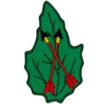 Two arrows crossed over each other on a green leaf.