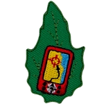 An electronic device displayers a geocaching map on a green leaf.