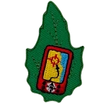 An electronic device displayers a geocaching map on a green leaf.