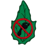 A footprint with a red circle and a line through it crossing it out on a green leaf.