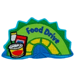 The hump of a green and yellow sea serpent. The words Food Drive are on the hump and non-perishables are on the bottom left.