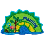 A green and yellow sea serpent hump with the word Planting on the right and blooming flowers on the left.