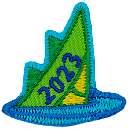 The tip of a sea serpent's tail peeks out of a pool of water. The date 2023 is embroidered on the tail.