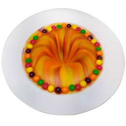 A Skittle floating M experiment. 