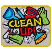 The words Clean Up! surrounded by cleaning supplies.